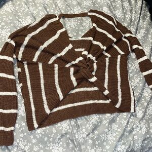 I'm selling a cross back sweater. Fun for that fall look. Off the market soon.